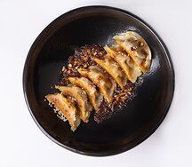 Жареные пельмени со свининой