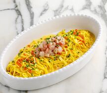 Тальолини со сливочным соусом и риччолой